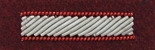 Stopień Wojska Polskiego haftowany bajorkiem do beretu bordowego (tłoczonego) - starszy szeregowy specjalista